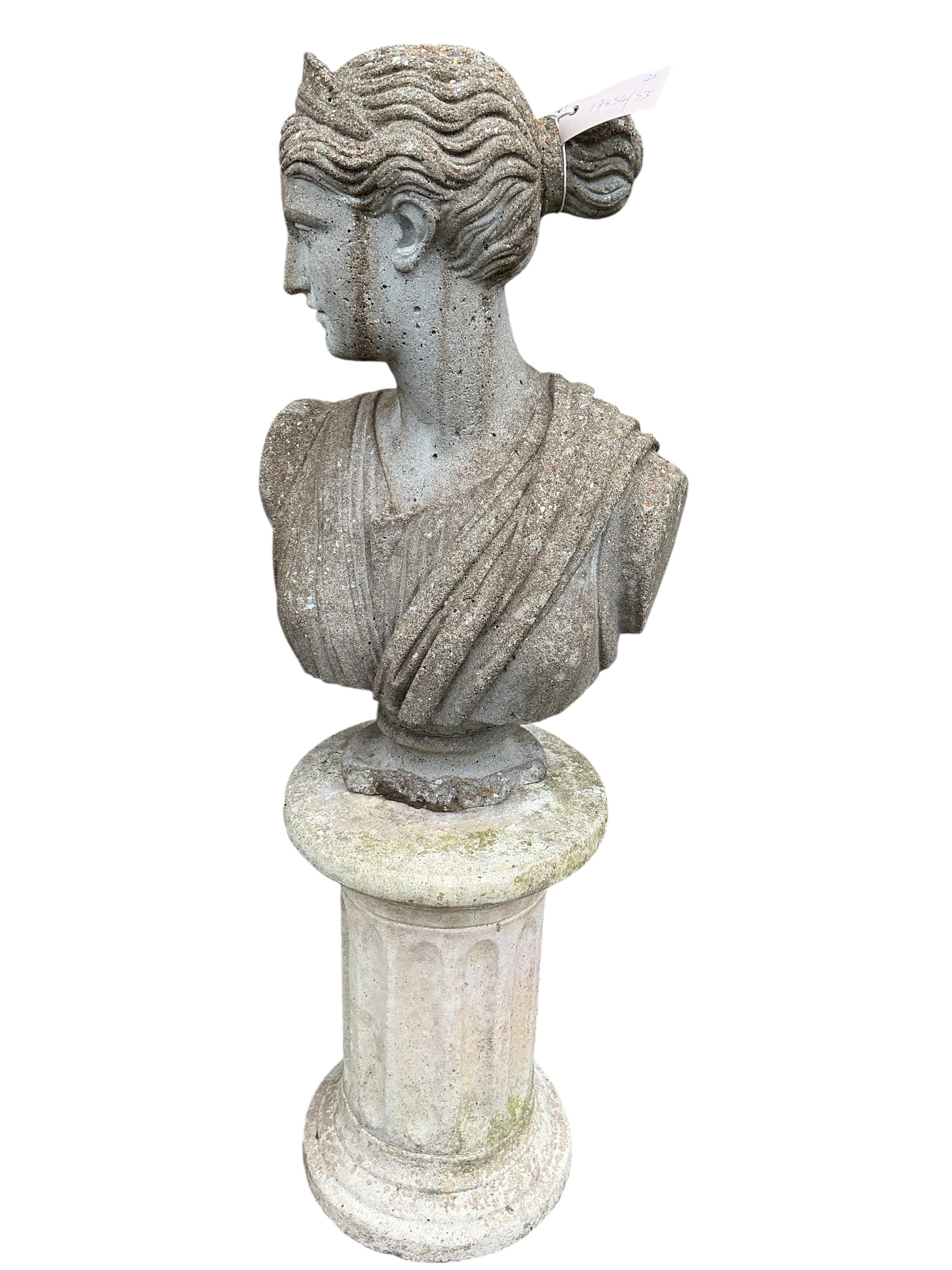 Two reconstituted stone female bust garden ornaments on fluted pillars, larger height 86cm